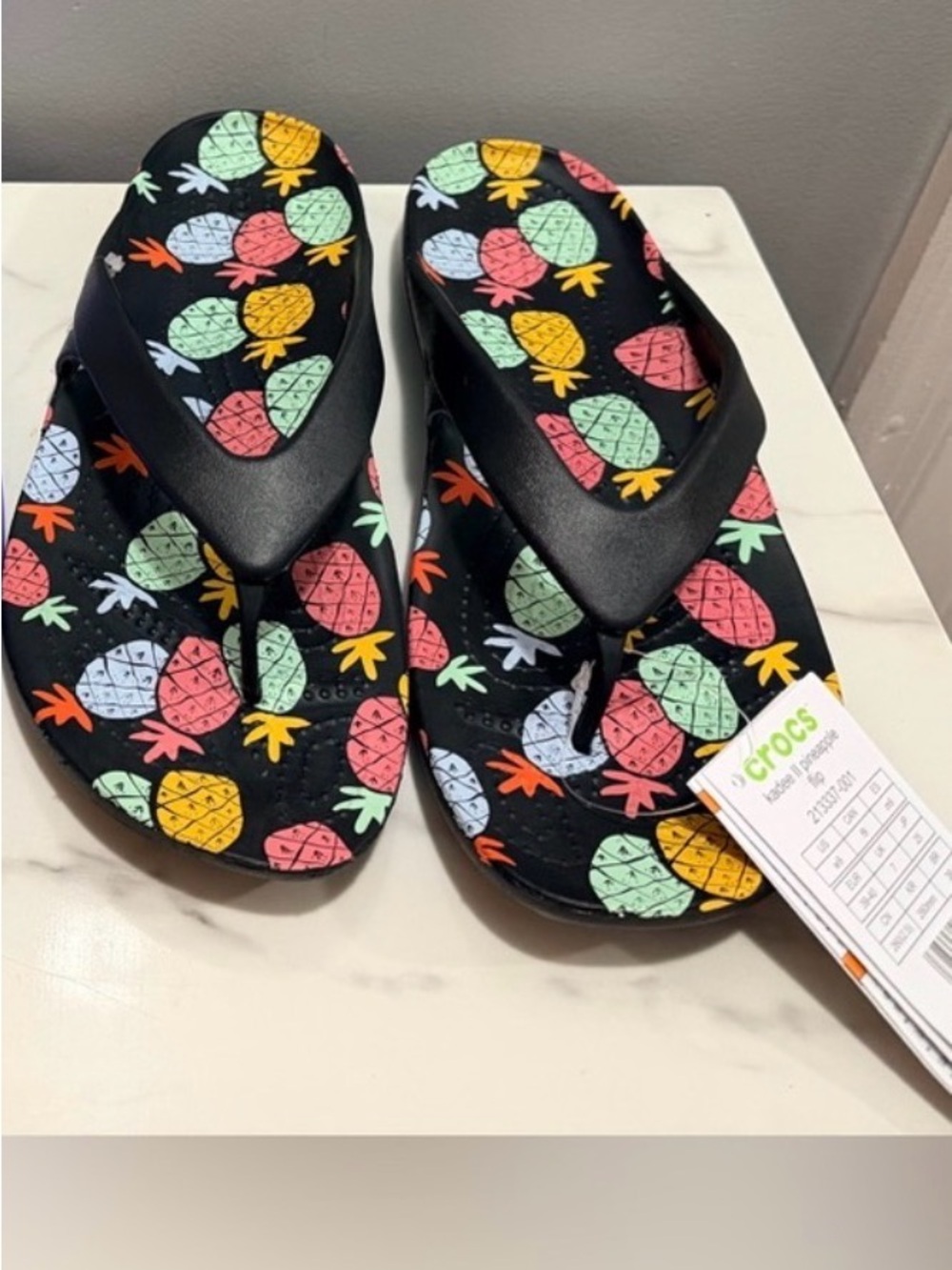CROCS kaydee II Black Flip Flop Sandals with Multicolor Pineapple Print